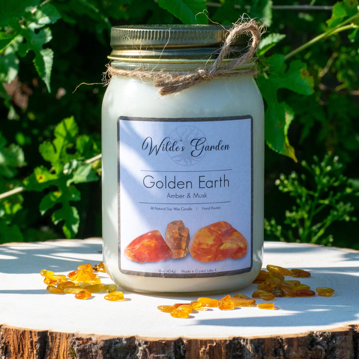 Golden Earth, 16oz Mason Jar Candle, Amber and Musk Scented, Photo on Log