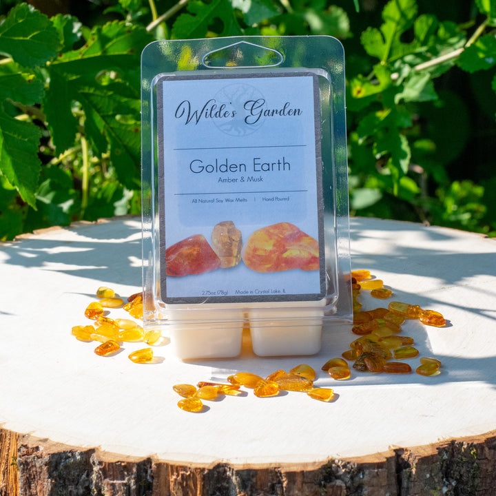 Golden Earth, Scented Wax Melts, Amber and Musk Scented, Wilde's Garden, Photo on Log with Amber Pieces