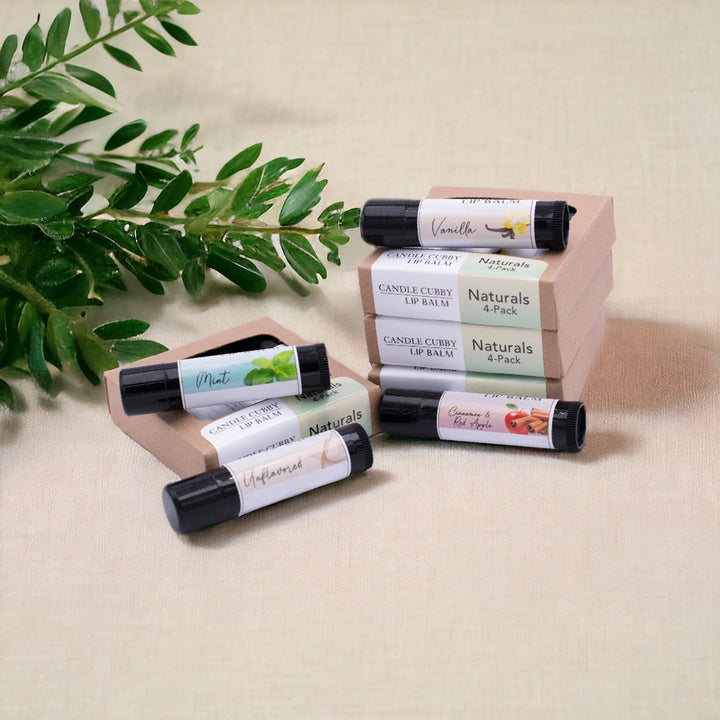 Naturals Lip Balm Pack, Classic Tubes, Unflavored, Mint, Vanilla, Cinnamon & Red Apple Flavored, Candle Cubby, Stacked Boxes with Plants in Background