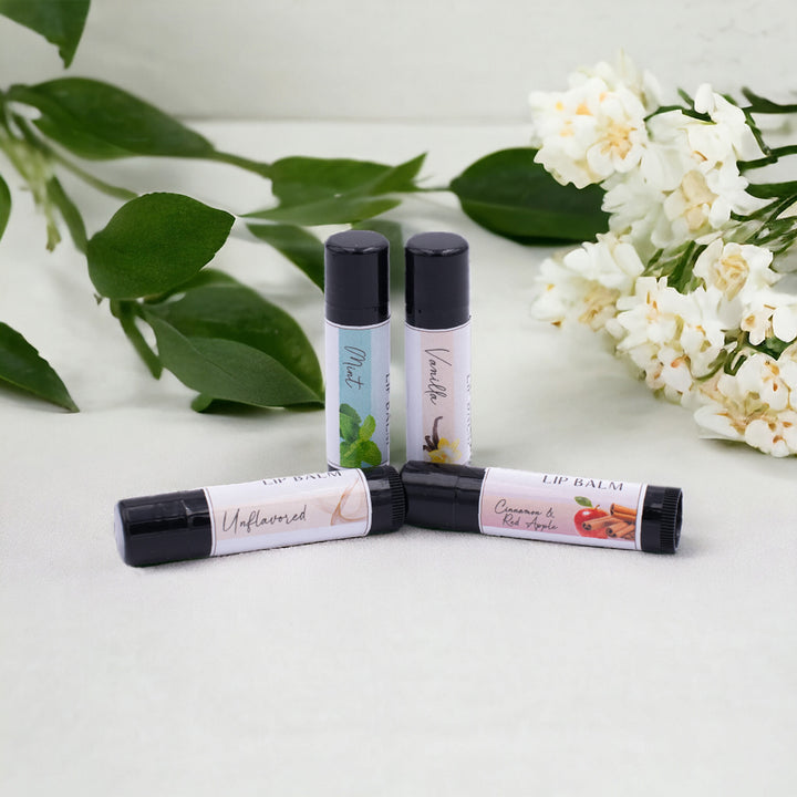 Naturals Lip Balm Pack, Classic Tubes, Unflavored, Mint, Vanilla, Cinnamon & Red Apple Flavored, Candle Cubby, Free Standing Tubes with Plants in Background